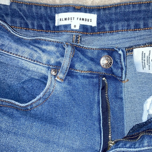 Almost Famous ripped flair jeans. Size 0, comfortable and stretchy material. - Picture 3 of 4